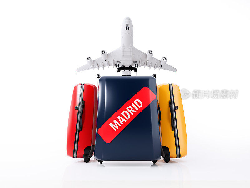 彩色行李与红色马德里贴纸孤立在白色背景:旅游概念