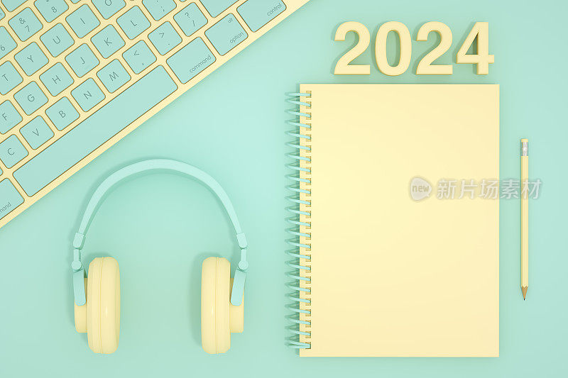 2024年新年，蓝绿色背景的空白页笔记本和键盘