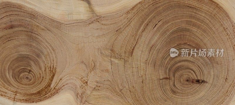 木质材料背景表面带有自然图案，树木年轮。