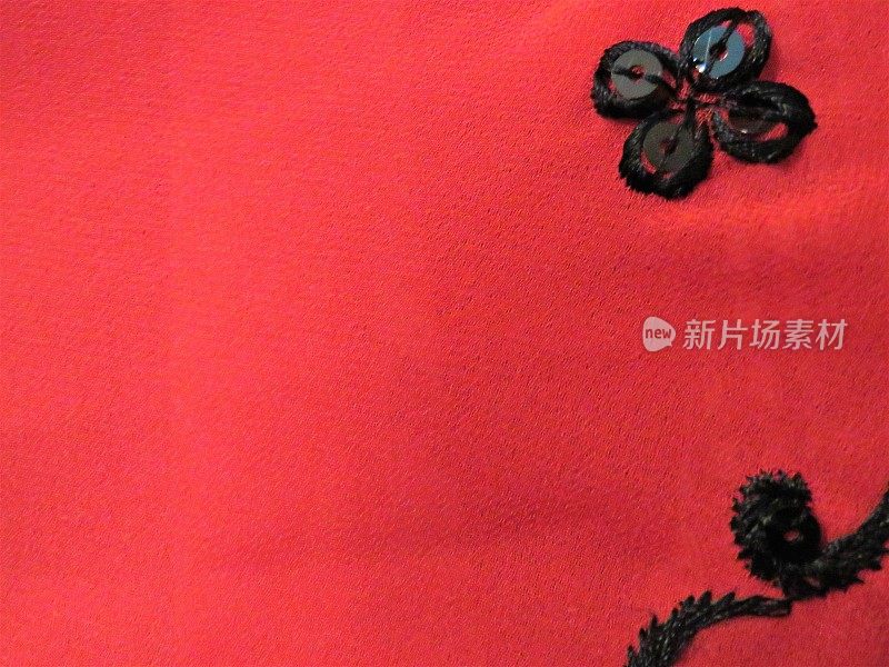 背景，红色与黑色亮片花的边框