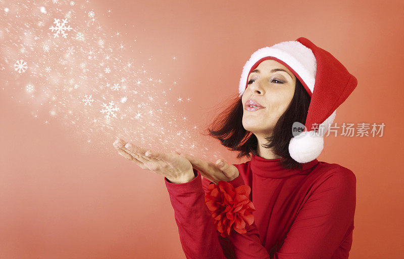 圣诞老人女人吹雪花