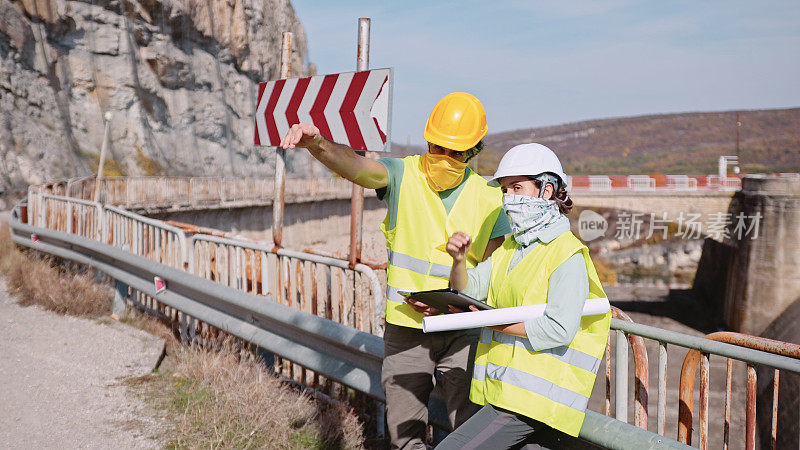 道路建设工程师的工作。在COVID-19大流行期间修建新的公路。