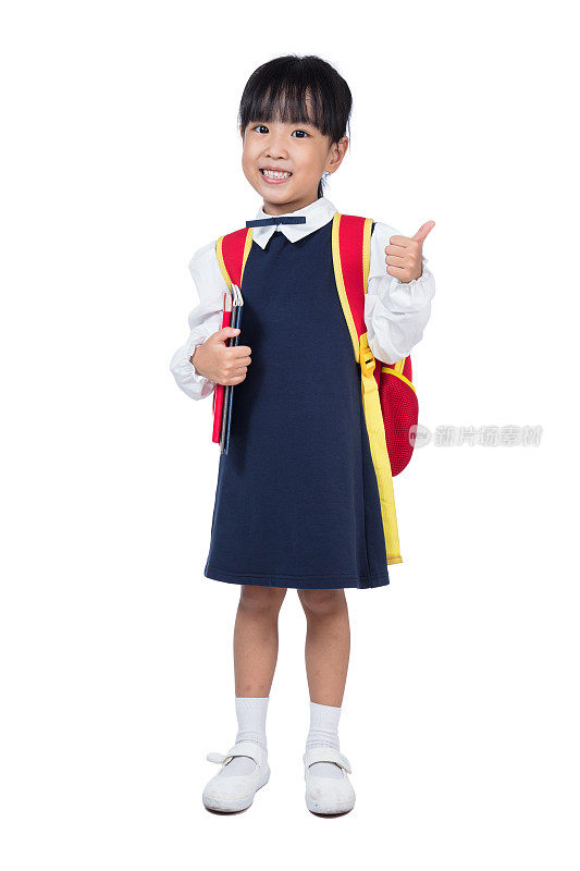 亚洲小中国女孩穿着校服和书包
