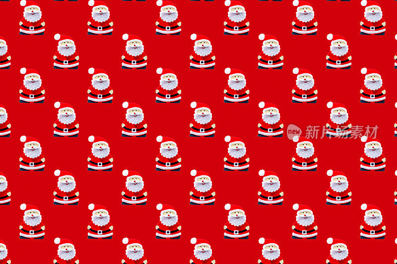 圣诞老人-平面无缝图案上的红色背景为圣诞包装纸的概念