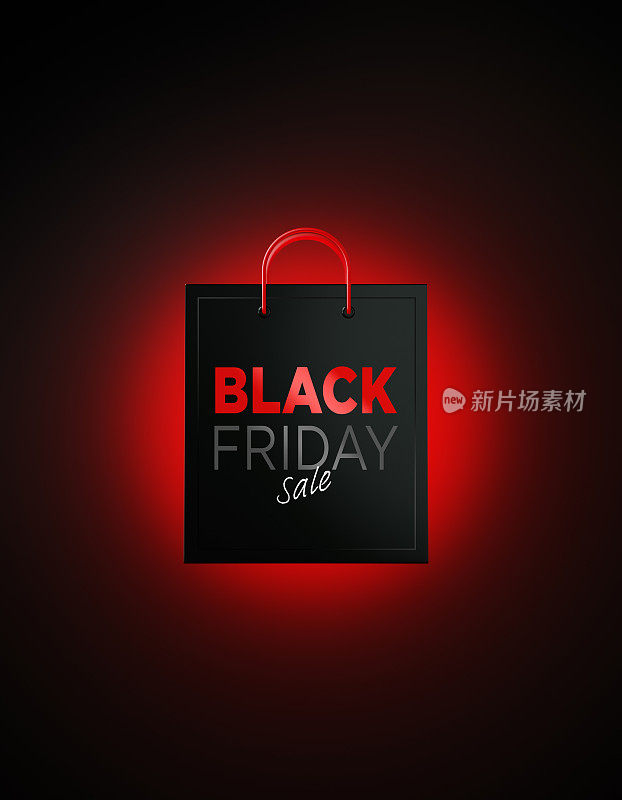 黑色星期五购物概念:发光的黑色星期五销售写在黑色背景购物袋