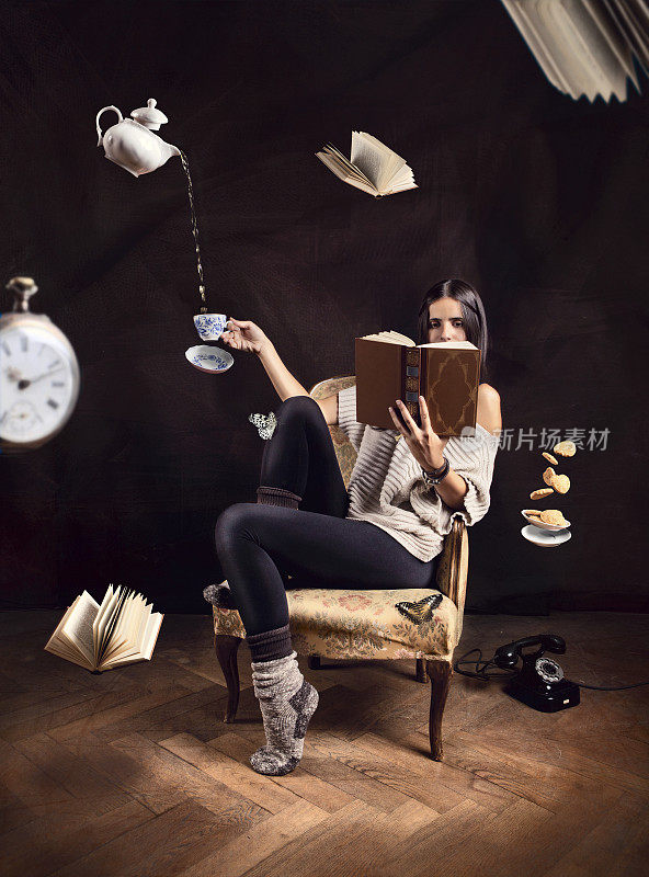 一个女人在看书，周围有抽象的飞行物品