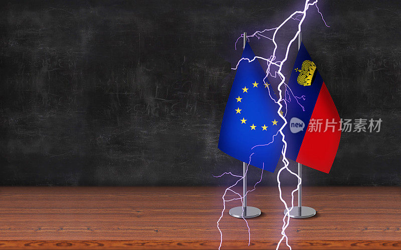 国与国冲突概念;欧盟和列支敦士登的3D课桌旗帜与雷声一起站立在桌子上，前面的黑板背景有较大的拷贝空间。