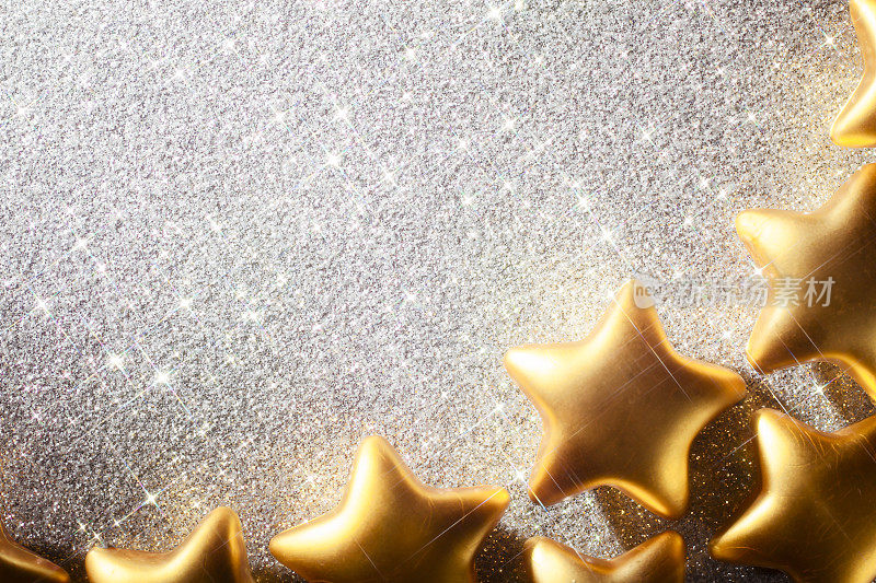 金色的圣诞星星-闪耀的背景纪念日金