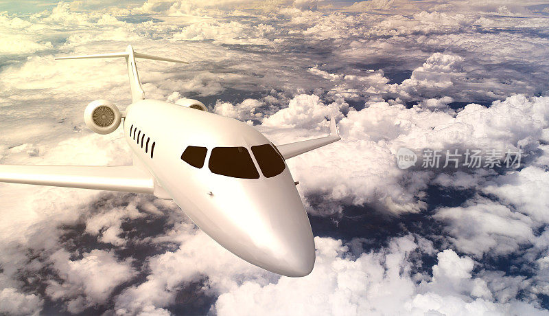 前视图的私人learjet飞机飞过云层