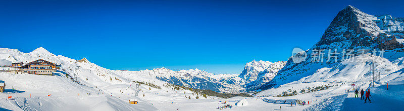 阿尔卑斯山冬季运动滑雪场滑雪者雪山全景瑞士