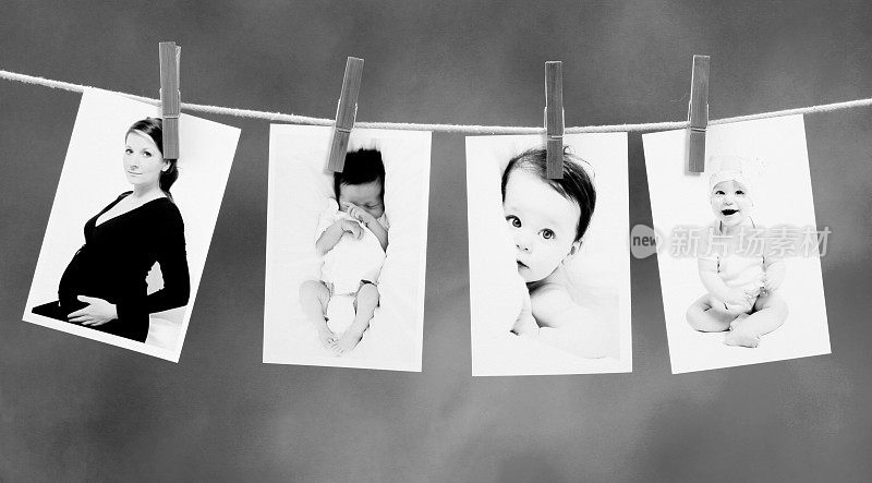 四张新生儿挂在晾衣绳上的照片