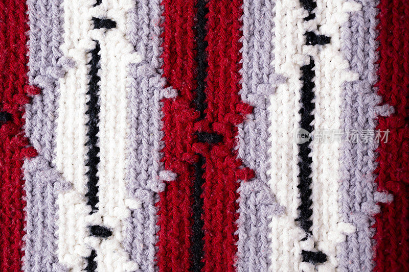 背景。钩针西南设计阿富汗毛毯。纱线。纺织。