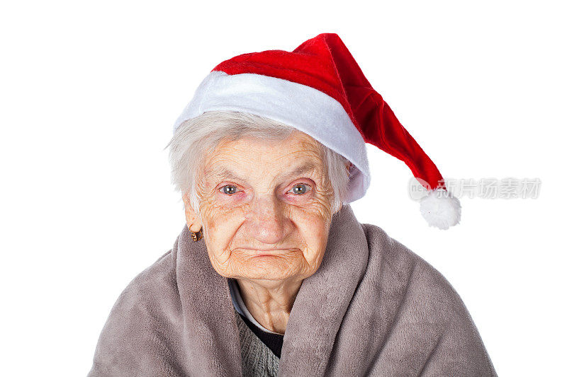 老太太戴着圣诞老人帽和毯子