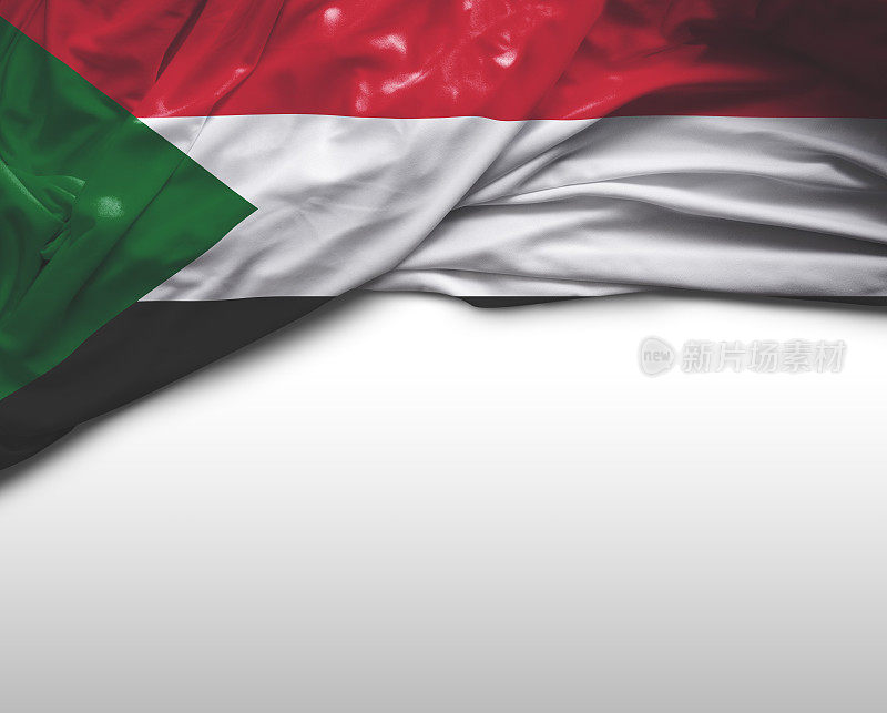 苏丹挥舞着国旗