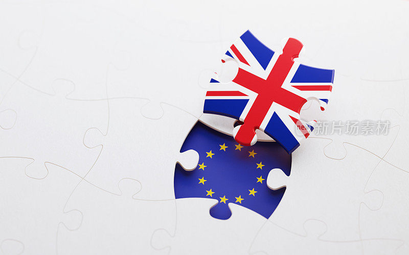 英国脱欧概念-彩色拼图碎片纹理与英国和欧盟旗帜