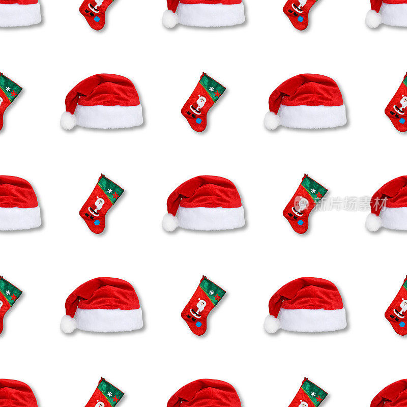 圣诞老人的圣诞红帽和圣诞袜孤立在白色的背景上。