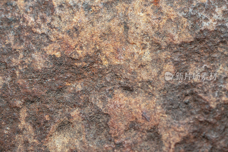 岩石的纹理表面与棕色色调背景