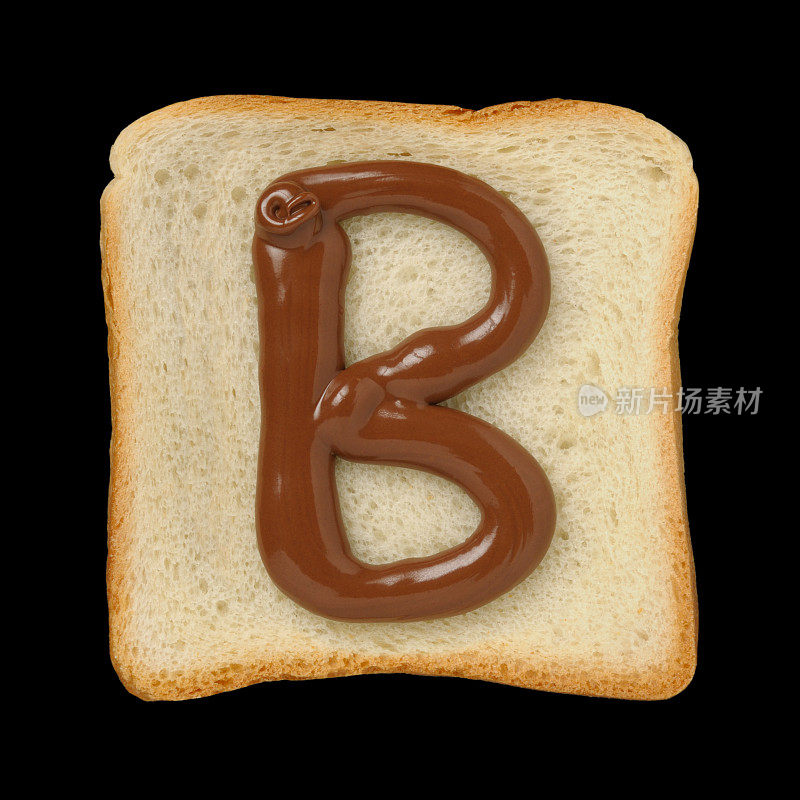 巧克力字母B在锡箔面包片，黑色背景