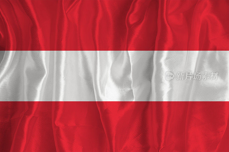 以丝绸为背景的奥地利国旗是一个伟大的国家象征。国家的官方国家象征。奥地利国旗背景