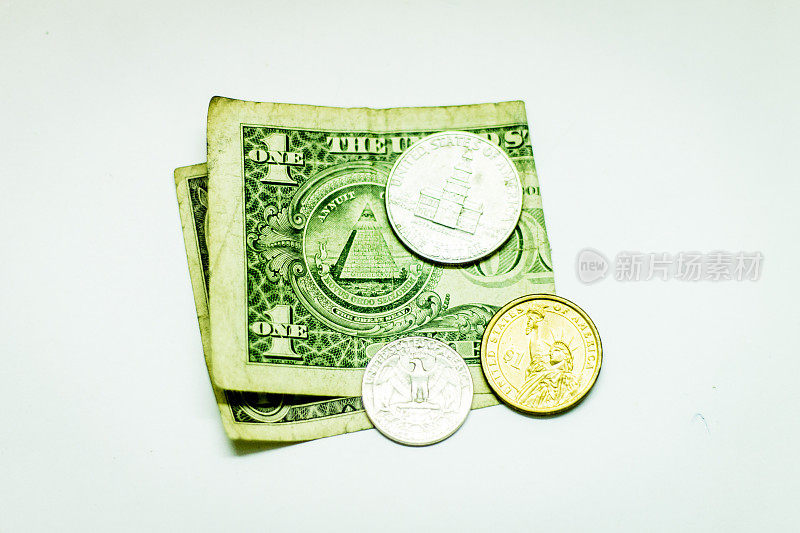 美元纸币和硬币