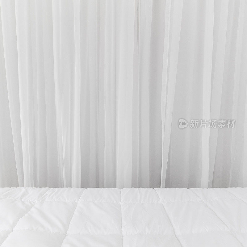 床上用品背景。白色窗帘织物背景。