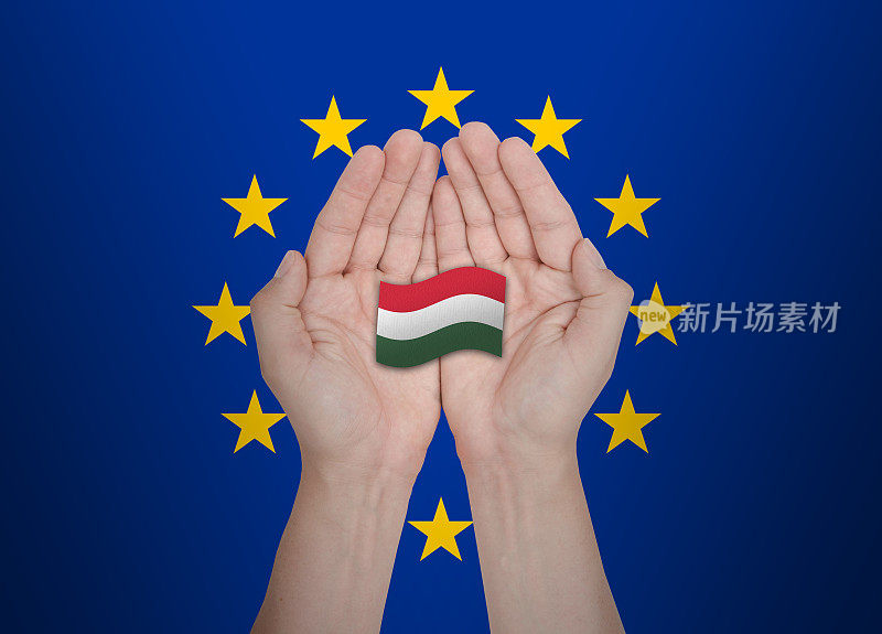 欧盟手保护欧盟成员国匈牙利的旗帜
