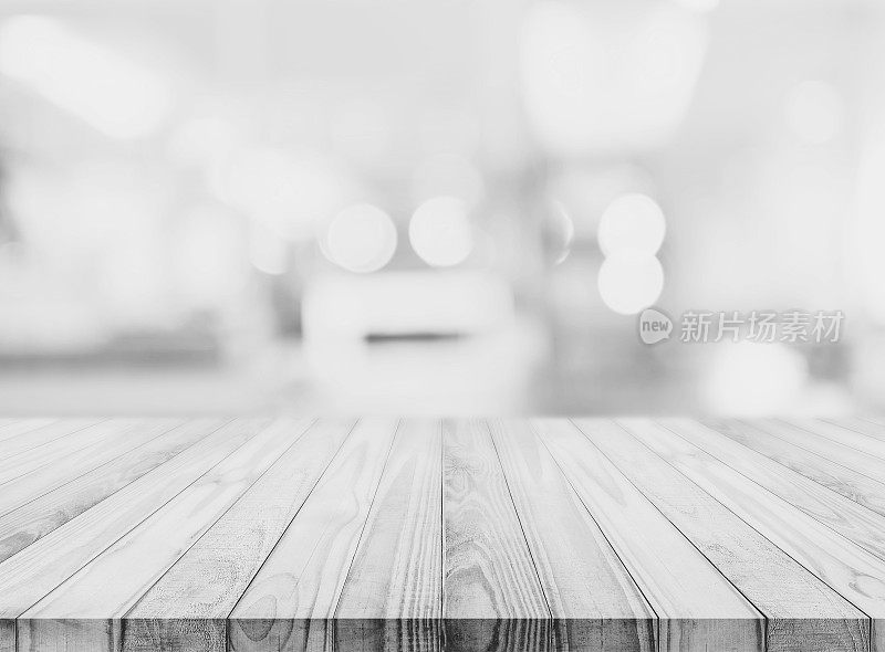 白色木质桌面与模糊散焦背景