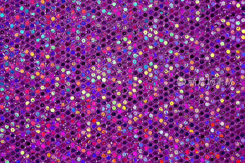 彩色亮片五彩纸屑闪光假日背景抽象紫色图案