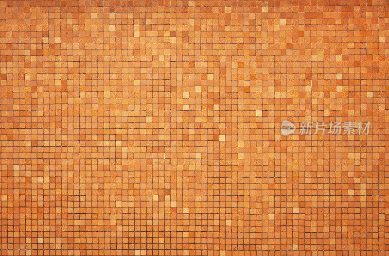 粉橙色瓷砖墙纹理背景
