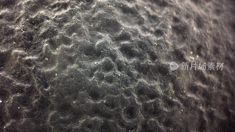 显微镜下的灰尘表面