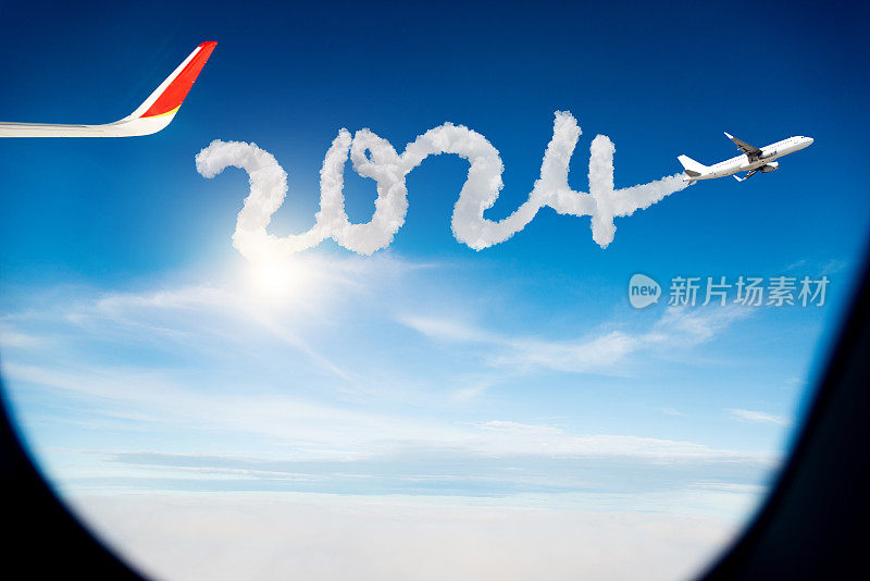 天空中写着新年数字2024的飞机