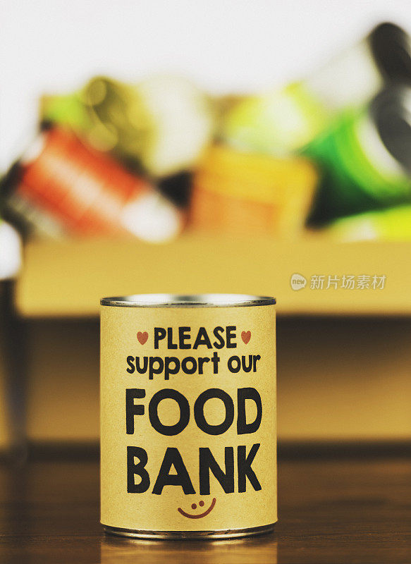 请支持我们的食品银行。罐头食品开车