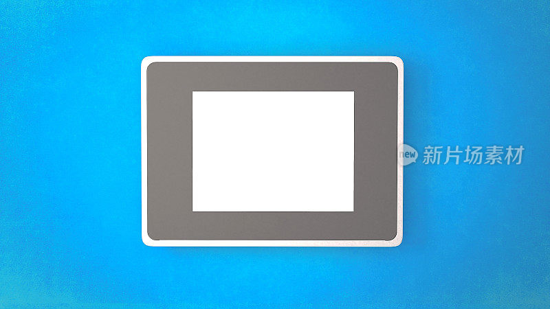 数字平板电脑屏幕与蓝色复制空间