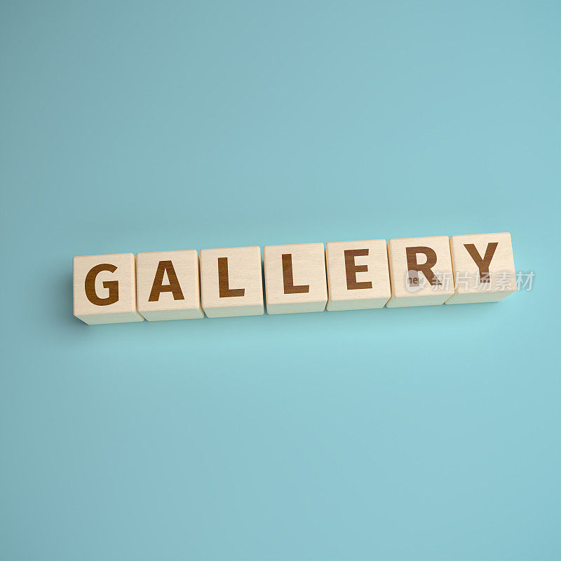 gallery这个词是用木制立方体上的字母拼成的。带有复制空间的高角度视图