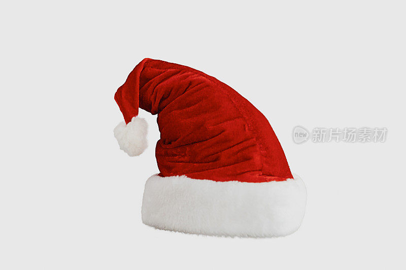 白色背景上的圣诞老人的红色帽子。