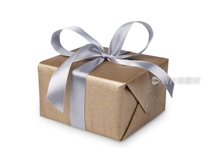 圣诞礼物盒在金色的纸上孤立的白色