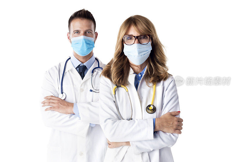 医疗队站在孤立的白色背景下的摄影