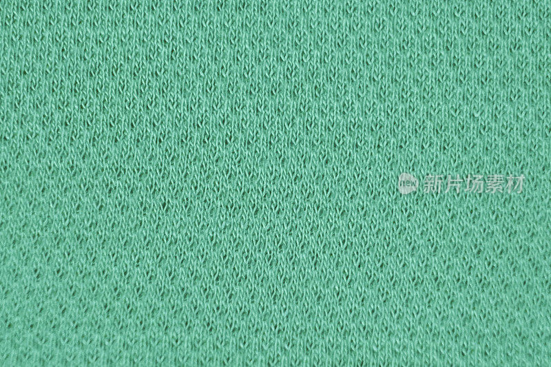 绿色纺织经编织物背景
