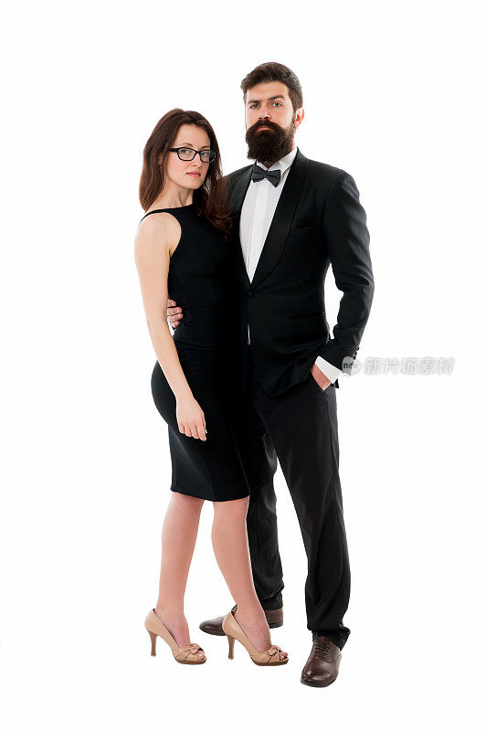 女士优雅的女士和留胡子的绅士黑色燕尾服与领结。正式的事件。着装规则。会议聚会仪式。着装概念。一对夫妇准备参加派对。正式的着装
