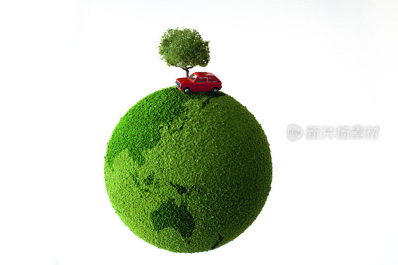 模型汽车和树在一个长满草的地球上