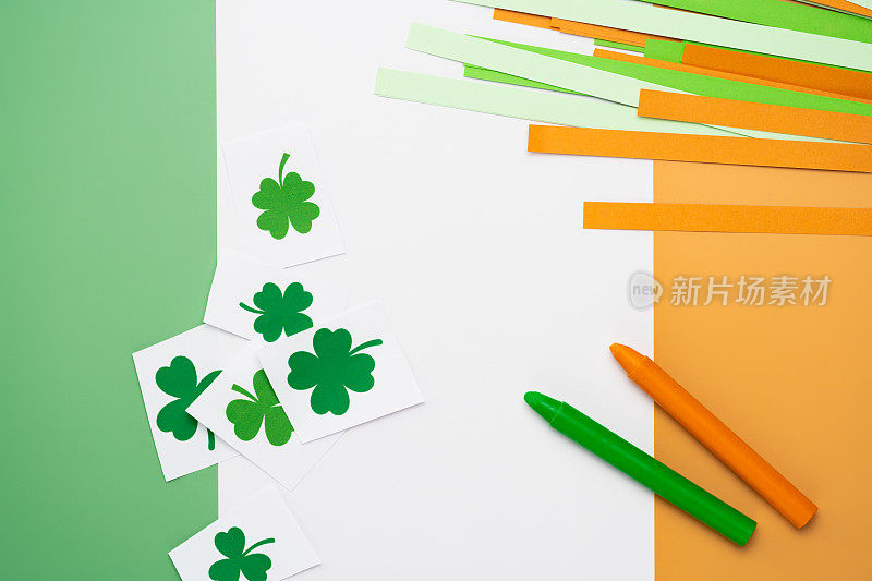 爱尔兰国旗由彩色纸剪出三叶草和蜡笔