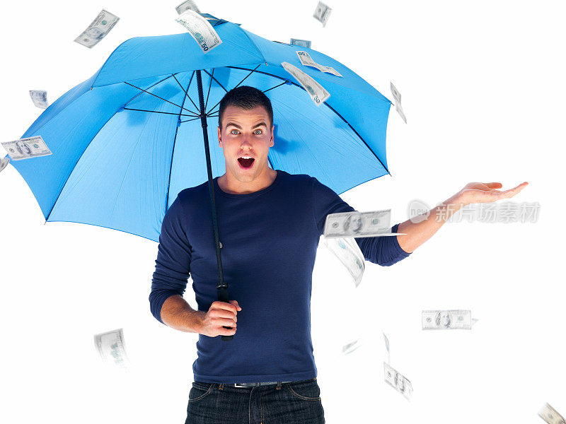 剪下了一个惊讶的年轻人在钱掉下来的时候撑着伞