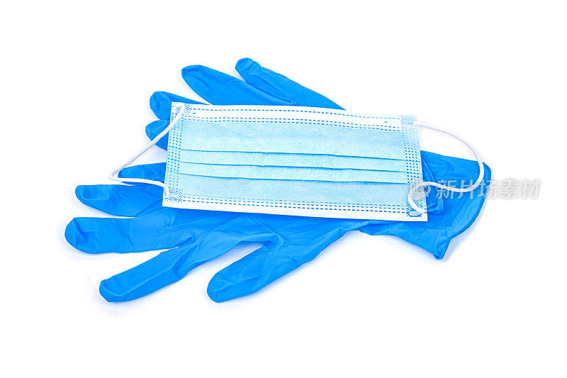 病毒保护。蓝色橡胶手套和白色背景的医用口罩