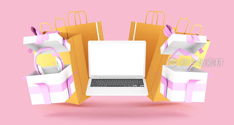 网上购物的概念。超薄笔记本电脑与购物和礼品项目的侧面。