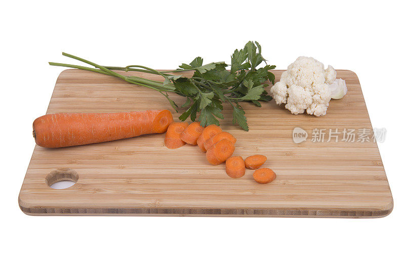 菜花，胡萝卜，欧芹放在桌上