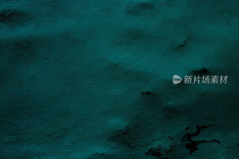 汽油色墙壁背景与纹理的不同深浅的蓝绿色