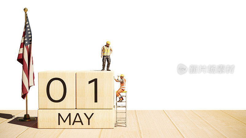 5月1日。每月的第一天。微型工人木块日历。劳动节的概念。三维演示