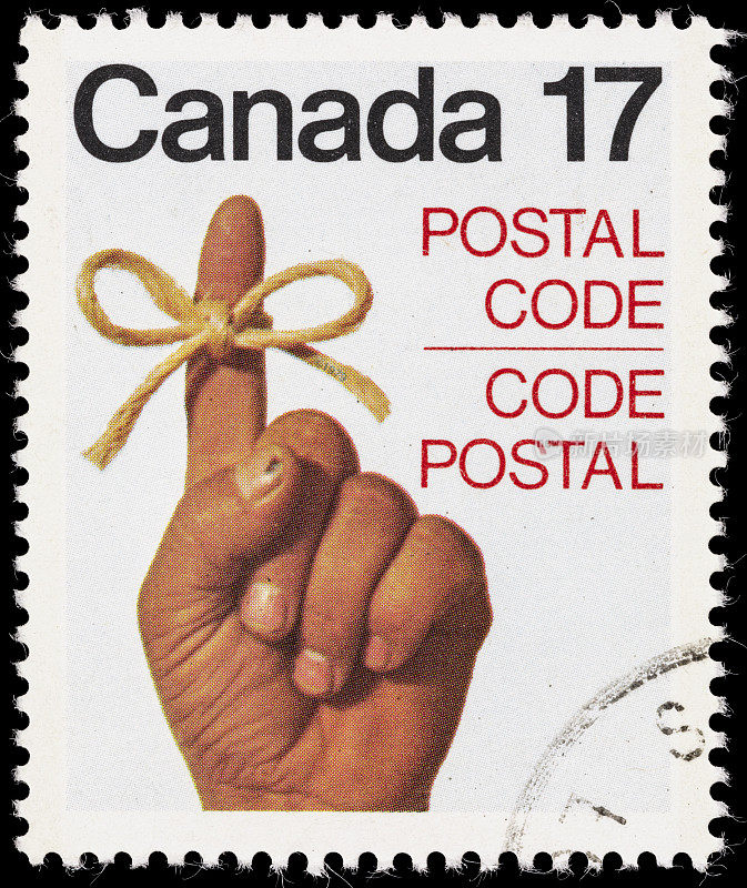 加拿大麻绳绑在手指邮票上