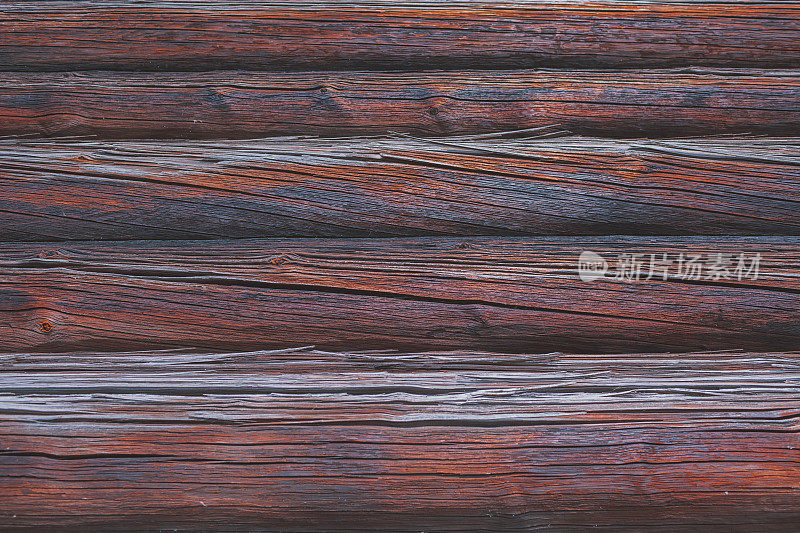 暗木干红风化的原木小屋墙壁背景
