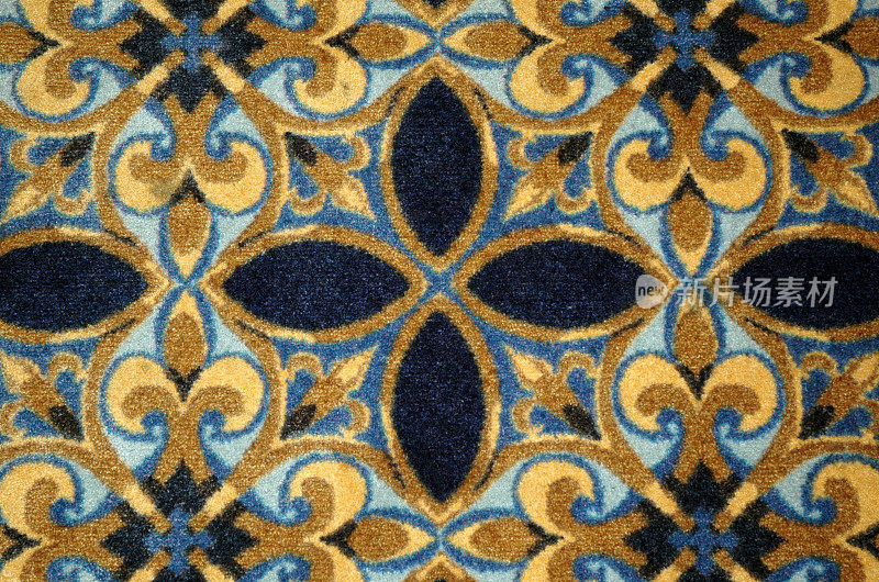 美丽的地毯图案细节-蓝色和金色